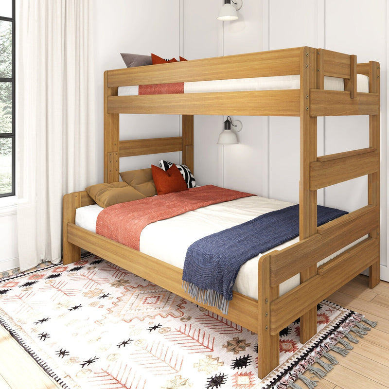 Wooden bunk bed in natural oak finish with orange and navy bedding, patterned area rug and wall sconce in a bright modern bedroom