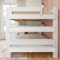 Whitewashed wooden loft bunk bed with neutral beige bedding, woven mattress trim, wall sconce and large window with beige curtains in a modern farmhouse bedroom