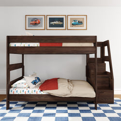 Dark wood kids bunk bed with built-in staircase, car-themed bedding, three vintage car wall art prints and blue checkered rug in modern children's bedroom