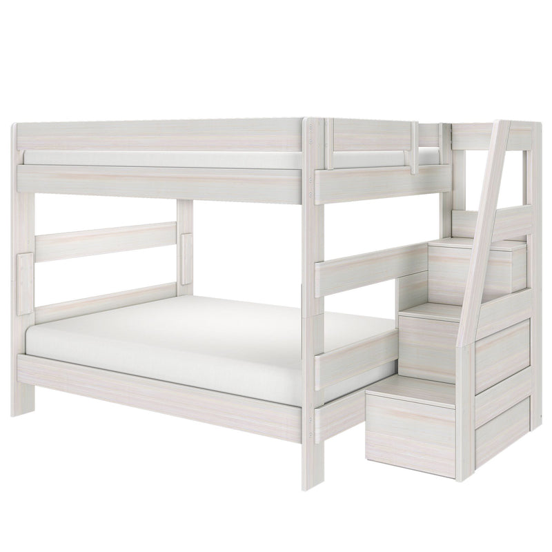 Whitewashed wood twin-over-full bunk bed with built-in storage stairs, space-saving kids bedroom furniture