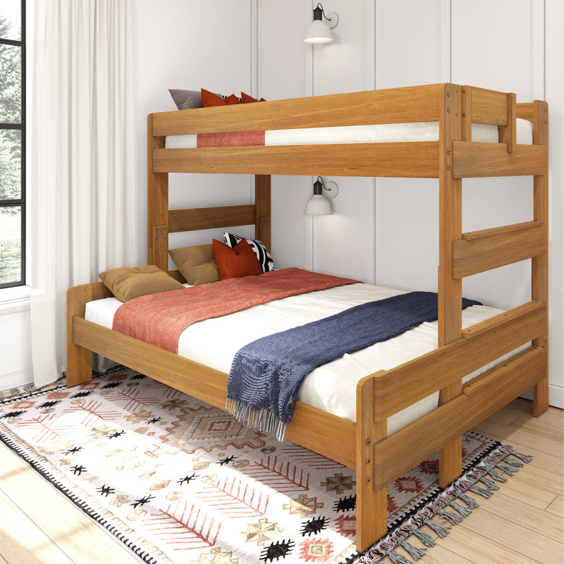Solid wood bunk bed frame in natural oak finish with cozy bedding, rust and navy throw blankets, patterned boho rug and wall sconces in a bright modern kids' bedroom