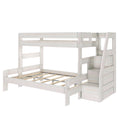 Whitewashed wooden loft bunk bed with ladder, built-in storage stairs, guardrails and slatted platform frame for kids' bedroom