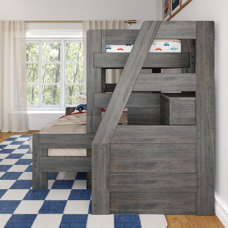 Gray weathered wooden bunk bed with built-in storage in kids' bedroom, car-patterned bedding and blue-and-white checkered rug
