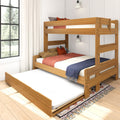 Modern solid wood bunk bed with pull-out trundle, twin-over-twin oak frame styled with rust and navy throws, decorative pillows, wall-mounted reading lamps and large black-framed window in bright farmhouse bedroom