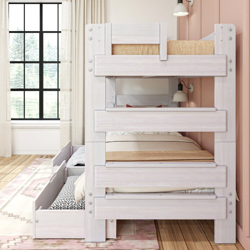 Wooden bunk bed with cozy bedding and storage drawers in a bright and stylish bedroom interior.
