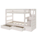 White wooden twin-over-twin bunk bed with built-in staircase and under-bed storage drawers, space-saving kids' bedroom furniture