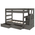 Gray wooden loft bunk bed with built-in staircase and storage drawers, slatted bed frame for kids' space-saving bedroom