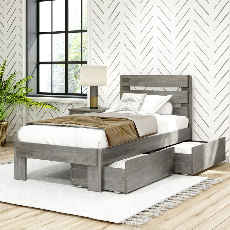 Modern farmhouse grey wood platform bed with under-bed storage drawers, neutral linens, geometric herringbone wallpaper, bedside lamp and black‑frame window