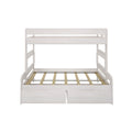 White wooden twin-over-full bunk bed with under-bed storage drawers and slatted platform, space-saving kids' bedroom furniture
