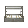 Gray wooden twin-over-full bunk bed frame with slatted mattress support and built-in storage drawers, rustic farmhouse finish