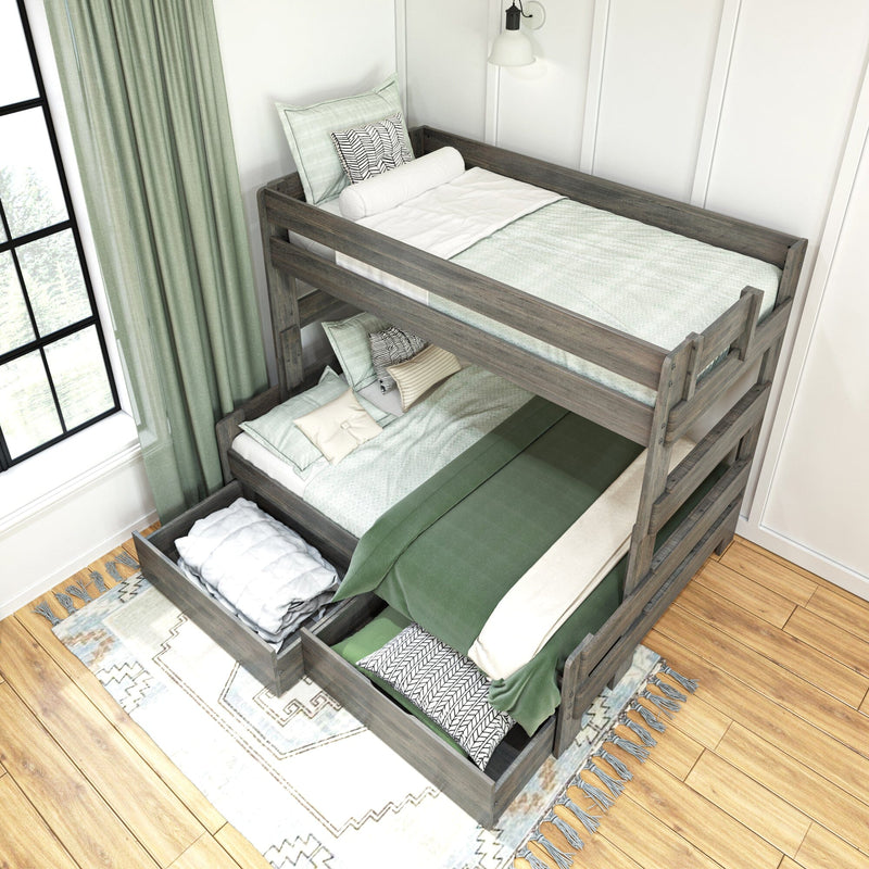 Modern wooden bunk bed with storage drawers, green bedding, and decorative pillows in a bright, cozy bedroom setting.