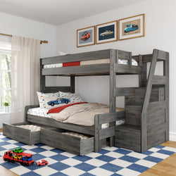 Gray wooden bunk bed with staircase storage and pull-out under-bed drawers in a child's bedroom with car-themed bedding and framed car wall art
