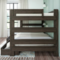 Dark wood bunk bed with white bedding in a modern bedroom featuring a wall sconce, large grid window, sheer curtains, hardwood floor and area rug