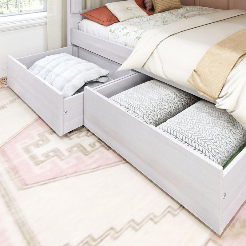 Under bed storage drawers with pillows and blankets in a modern bedroom setting.