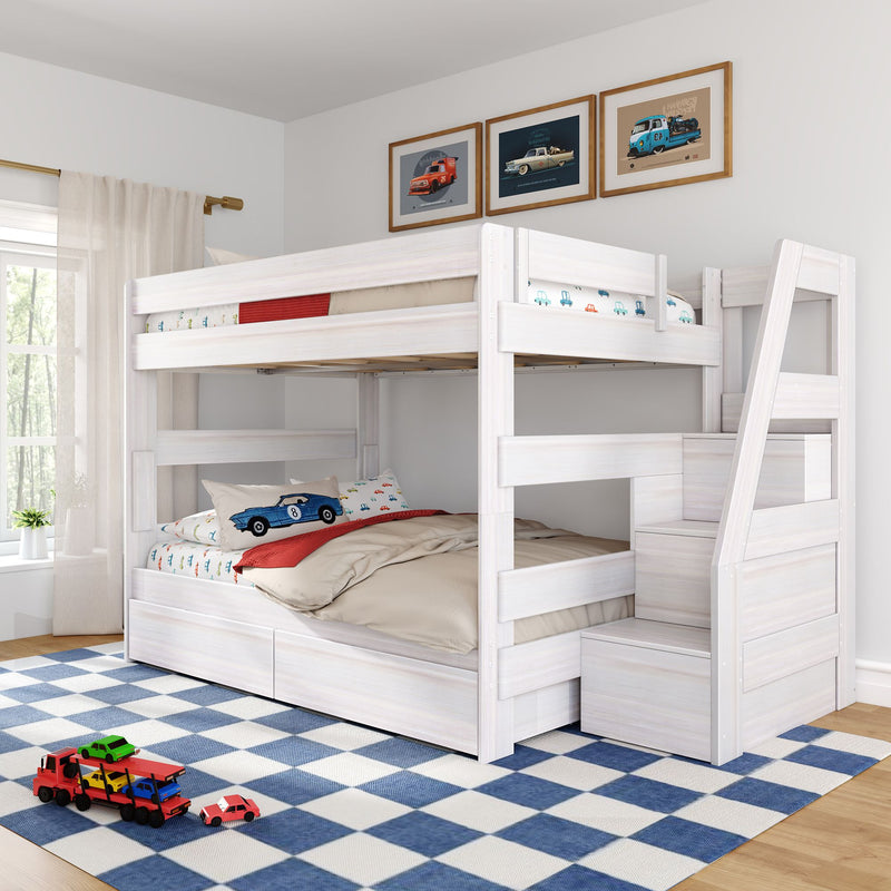 White wooden loft bunk bed with stairs and built-in drawers in kids' room, car-themed bedding and pillow, toy cars on blue checkered rug and framed car prints on wall