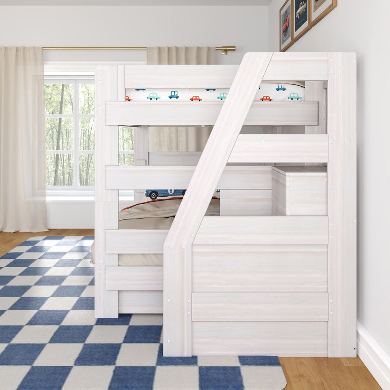 White wooden kids bunk bed with angled staircase and built-in storage, car-print bedding, blue checkered rug and large window in bright children's bedroom
