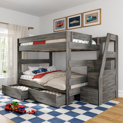 Gray wooden twin-over-full kids bunk bed with built-in stair storage, two under-bed drawers, car-themed bedding, framed car prints and blue checkered rug