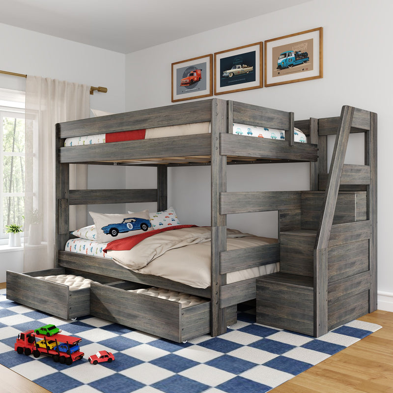 Gray wooden twin-over-full kids bunk bed with built-in stair storage, two under-bed drawers, car-themed bedding, framed car prints and blue checkered rug