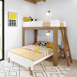 Modern wooden bunk bed with ladder and white guardrails in a minimalist children's bedroom, yellow patterned bedding and geometric rug