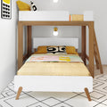 Modern wooden bunk bed with full lower bed, white accents, yellow bedding and patterned throw, geometric rug and ladder in Scandinavian kids' bedroom