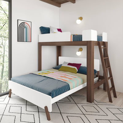 Modern full-over-twin loft bunk bed in white and walnut with ladder, colorful bedding, wall sconces and window-lit contemporary kids' bedroom
