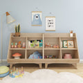 Pastel kids' playroom with wooden low bookshelf toy organizer, children's books, plush cloud pillow, stacking toys, mushroom stool, and wall art