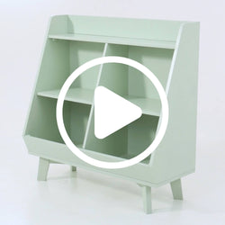 Mint green wooden children's bookshelf with angled open shelves and toy storage compartments on mid-century legs — kids book organizer and nursery storage (video preview)