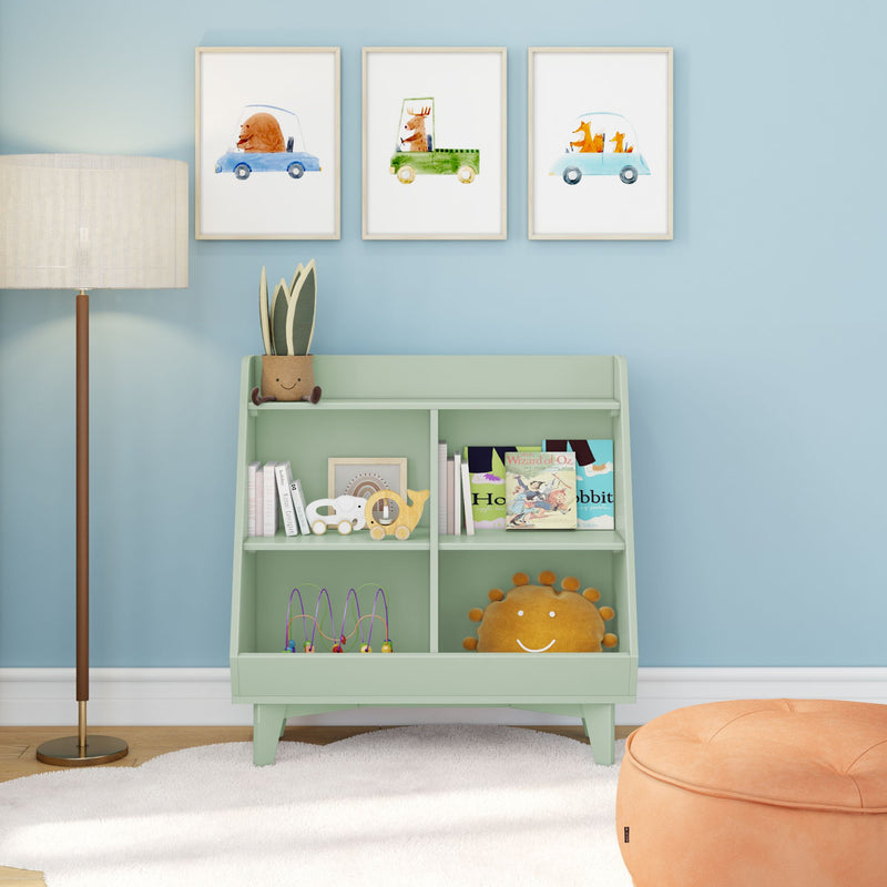 Mint-green kids bookshelf against blue nursery wall with framed animal prints, toys, books, plush sun pillow and orange pouf