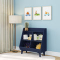 Light blue nursery with navy toy organizer bookshelf holding children's books, plush toys, and wooden toys beneath framed animal car wall art and a modern floor lamp