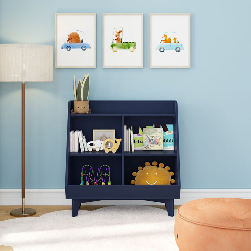 Navy blue children's bookshelf in nursery with kids' books, wooden toys, smiling sun cushion, watercolor animal car wall art, floor lamp and orange pouf