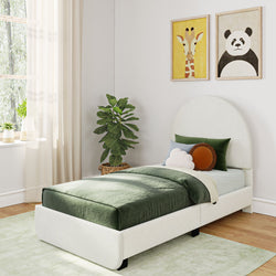 Bright modern kids bedroom with white upholstered twin bed, green duvet, animal wall art (giraffe, panda), potted plant and sheer window curtains