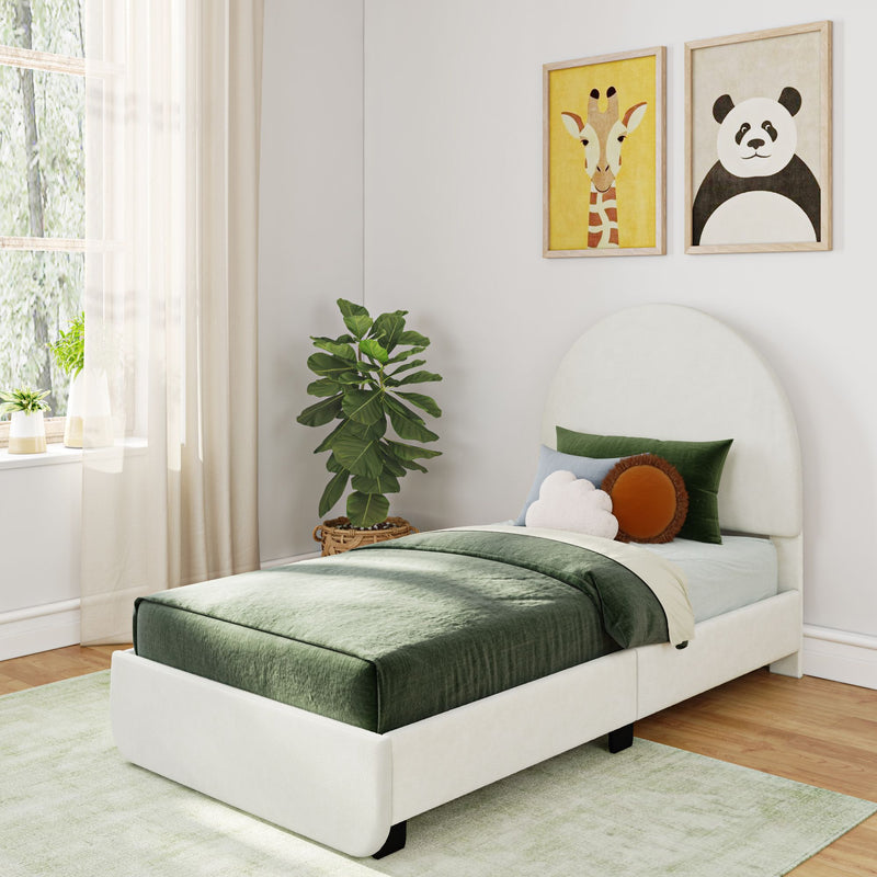 Minimalist kids bedroom with white single bed, green bedding, and playful giraffe and panda wall art.