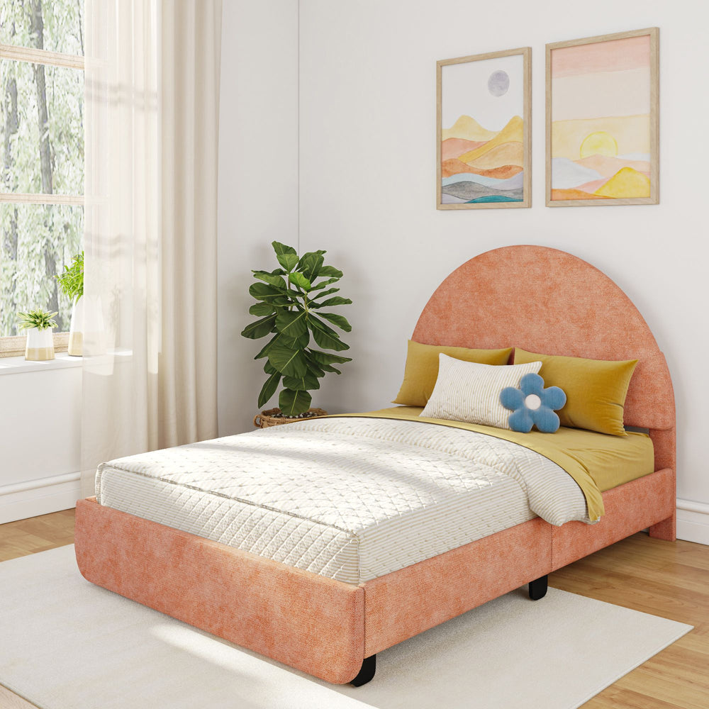 Cozy bedroom with an orange upholstered bed, yellow and blue pillows, and modern wall art, featuring natural light from large windows.
