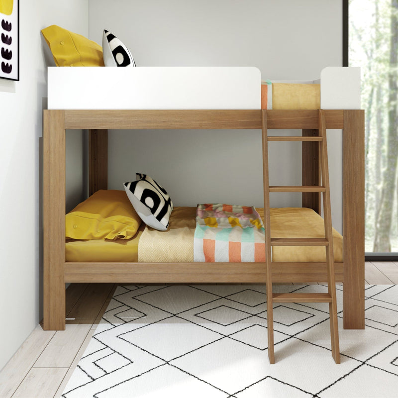 Wooden bunk bed with colorful bedding and geometric patterned rug in modern bedroom.