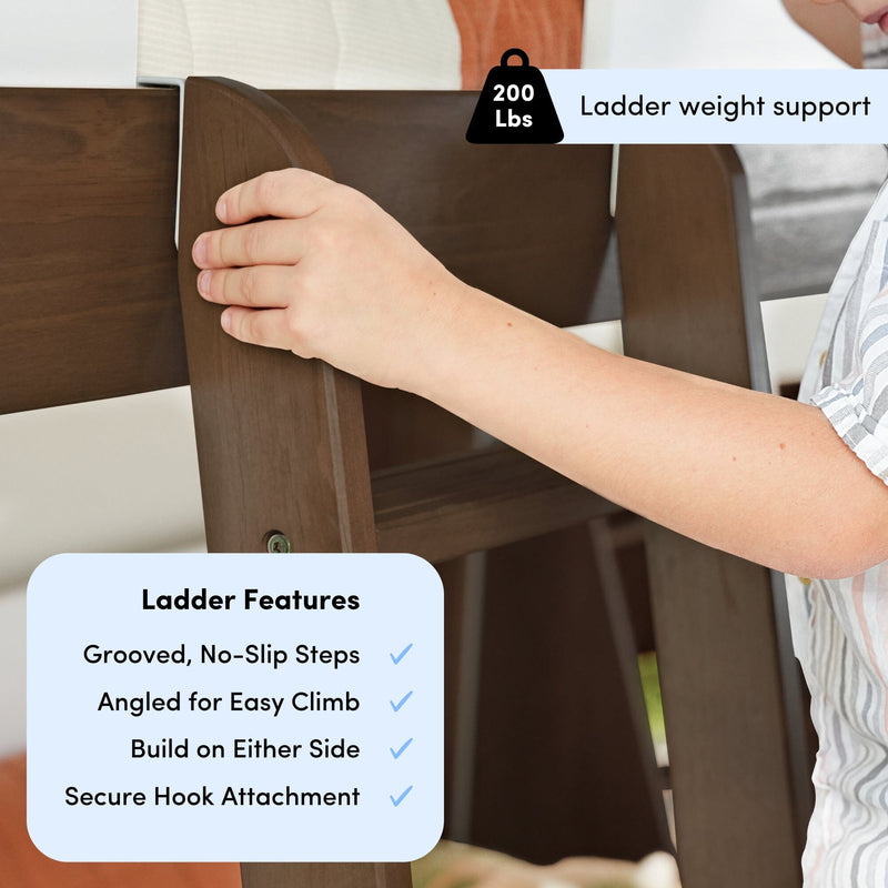 Close-up of a hand gripping a wooden bunk bed ladder with grooved no-slip steps, angled design, secure hook attachment and 200 lb weight support