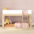 Modern natural wood loft bunk bed with ladder in pastel kids bedroom, pink quilt, yellow pillows, stuffed rabbit and arched pink wallpaper — children's bedroom decor
