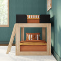Wooden kids loft bunk bed with orange bedding, striped pillow and stuffed rhino against teal textured wallpaper