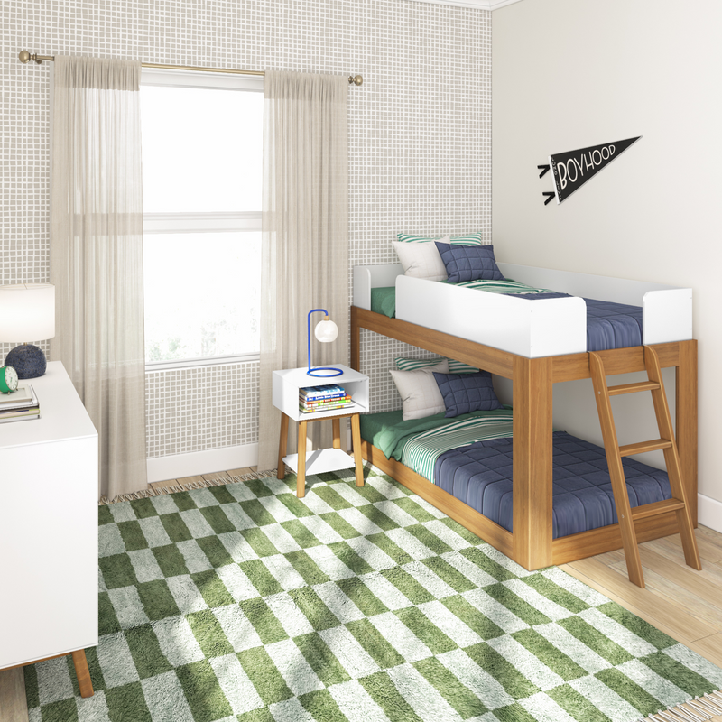 Modern kids' bedroom with wooden bunk beds, green and white checkered rug, and natural light.