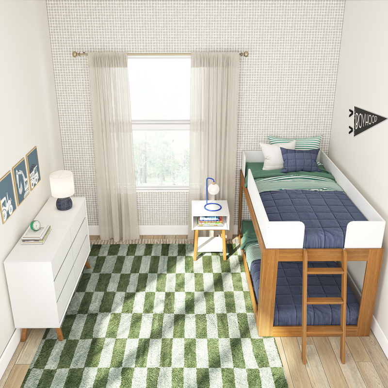 Modern kids bedroom with loft bed, green and blue bedding, geometric rug, dresser, and natural light.