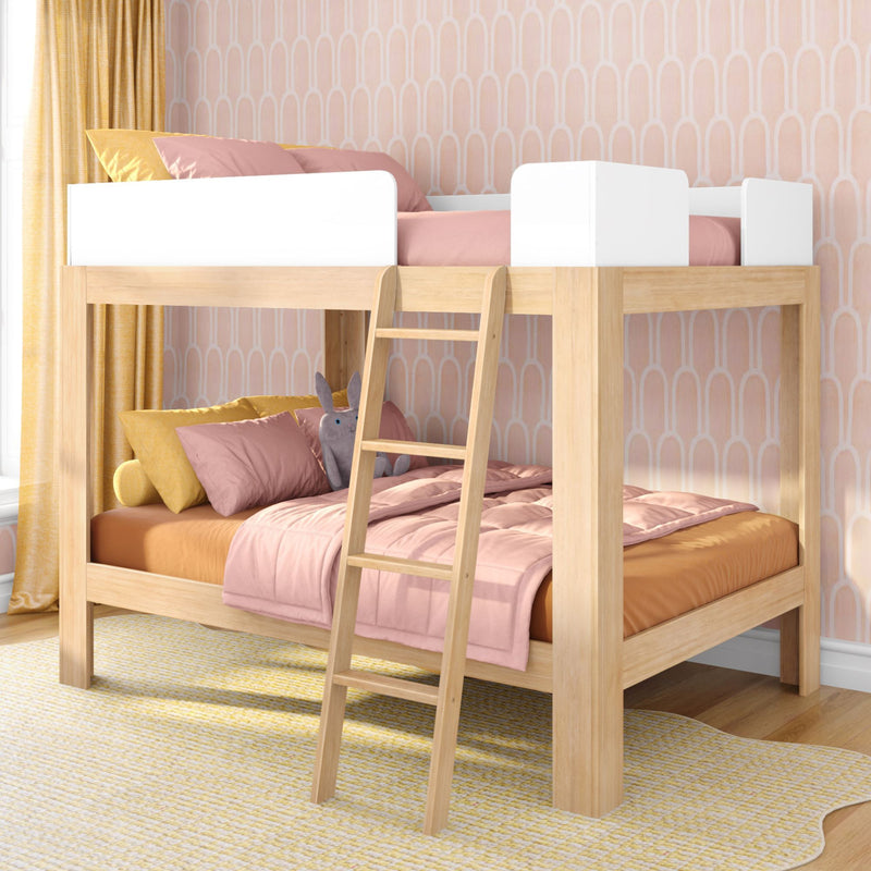 Wooden loft bunk bed with ladder in pastel pink and yellow children's bedroom, patterned wallpaper and plush pillows