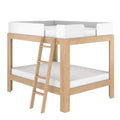 Modern twin loft bed with natural oak frame, built-in ladder and white safety guardrails — space-saving kids' bunk bed for small bedrooms