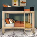 Modern wooden loft bunk bed with ladder and black safety rail, orange duvet and striped pillows in a kids' bedroom with green wall and framed art