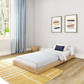 Modern minimalistic bedroom design with a single bed, light blue curtains, and abstract wall art.