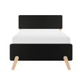 Front view of modern minimalist bed with rounded black headboard, white mattress and light wood angled legs on white background