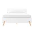 Modern white platform bed frame with light wood tapered legs, minimalist Scandinavian bedroom furniture