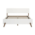 White mid-century modern wooden platform bed frame with slatted base, walnut angled legs and minimalist headboard, no mattress