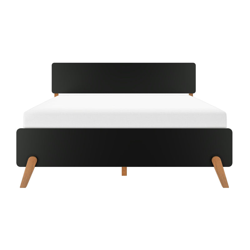 Modern black platform bed with rounded headboard and footboard, oak tapered legs and white mattress — minimalist mid-century bedroom furniture