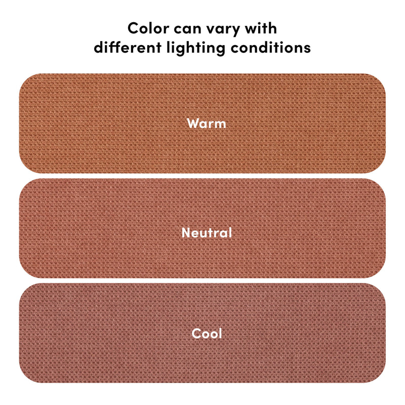 Fabric color comparison showing textured rust-colored swatches labeled Warm, Neutral, and Cool to illustrate how fabric color can vary under different lighting conditions