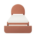 Terracotta upholstered twin platform bed with rounded arched headboard, white mattress and pull-out under-bed storage drawer