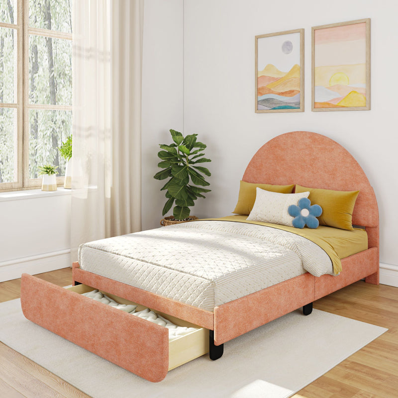 Stylish orange upholstered bed with rounded headboard, spacious under-bed storage, and cozy pillows in a sunlit bedroom with framed artwork and a potted plant.
